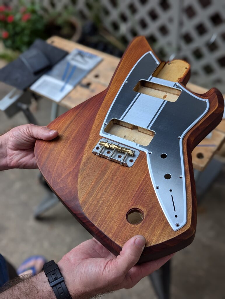 electric guitar body with pickguard